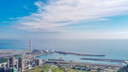 “港、廠、電三合一”循環(huán)經(jīng)濟讓法國參訪團驚嘆